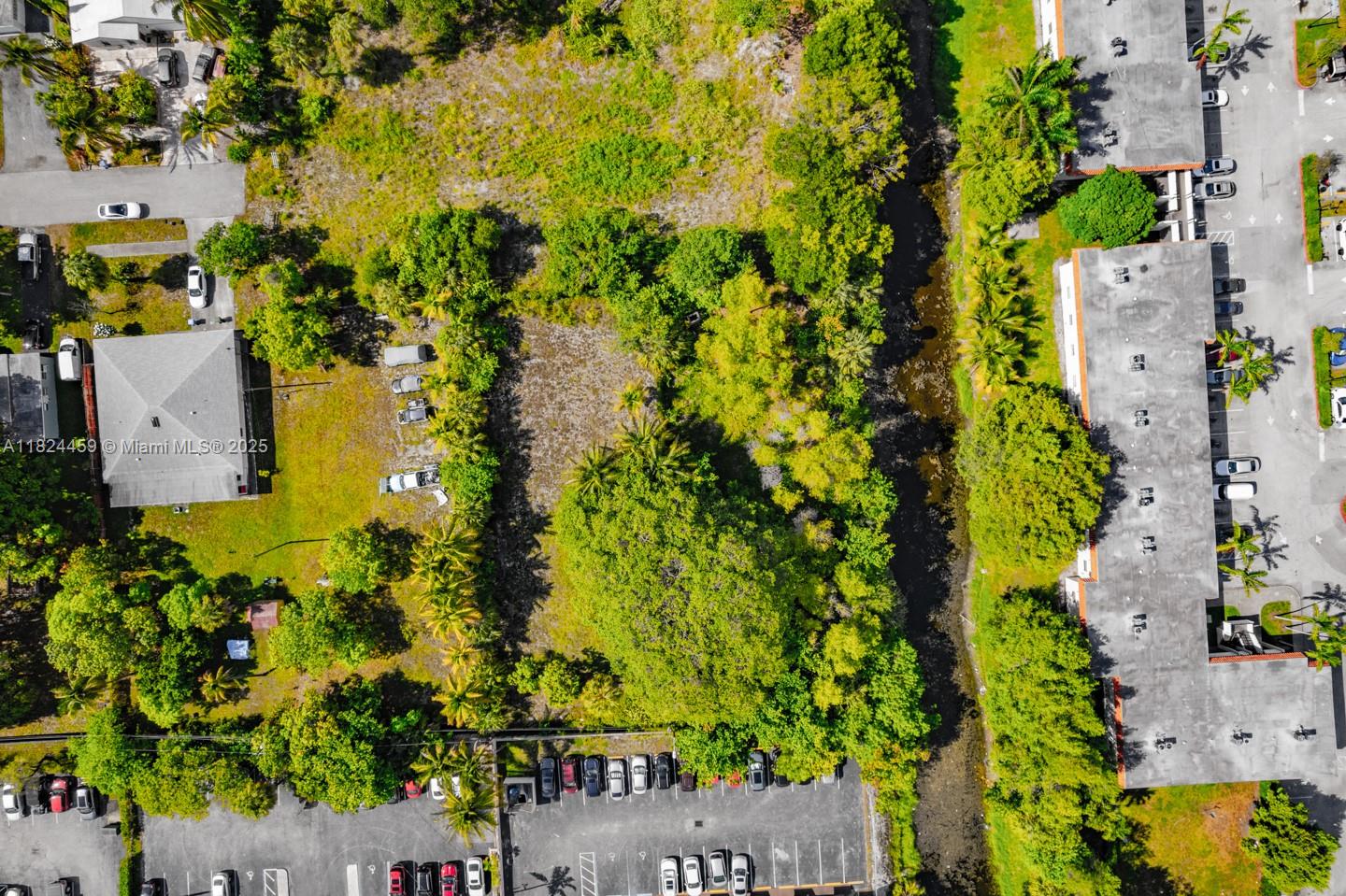 6214 Edwards Road Pompano Beach, FL 33063 - Photo 23 of 41 an aerial view of a house with a yard