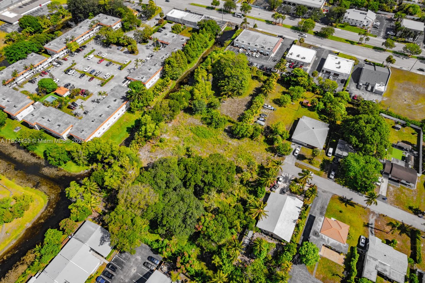 6214 Edwards Road Pompano Beach, FL 33063 - Photo 30 of 41 an aerial view of a residential houses with yard
