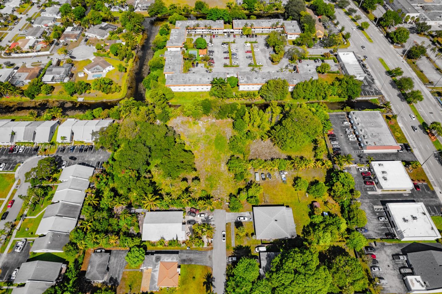 6214 Edwards Road Pompano Beach, FL 33063 - Photo 32 of 41 an aerial view of residential houses with outdoor space