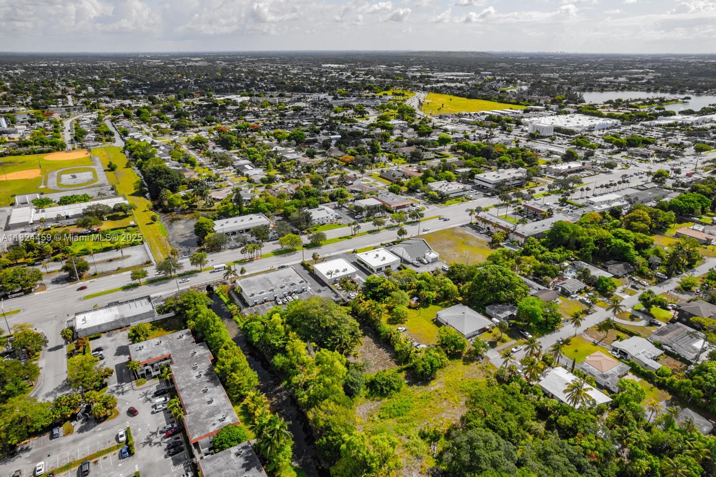 6214 Edwards Road Pompano Beach, FL 33063 - Photo 39 of 41 an aerial view of residential houses with outdoor space
