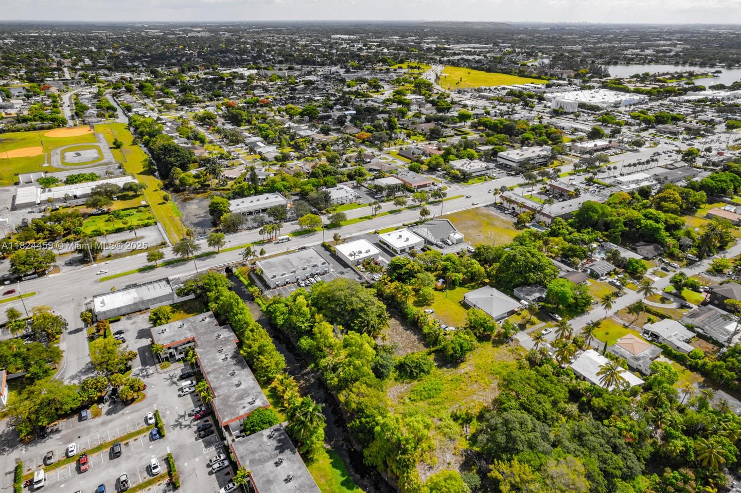 6214 Edwards Road Pompano Beach, FL 33063 - Photo 40 of 41 an aerial view of residential houses with outdoor space