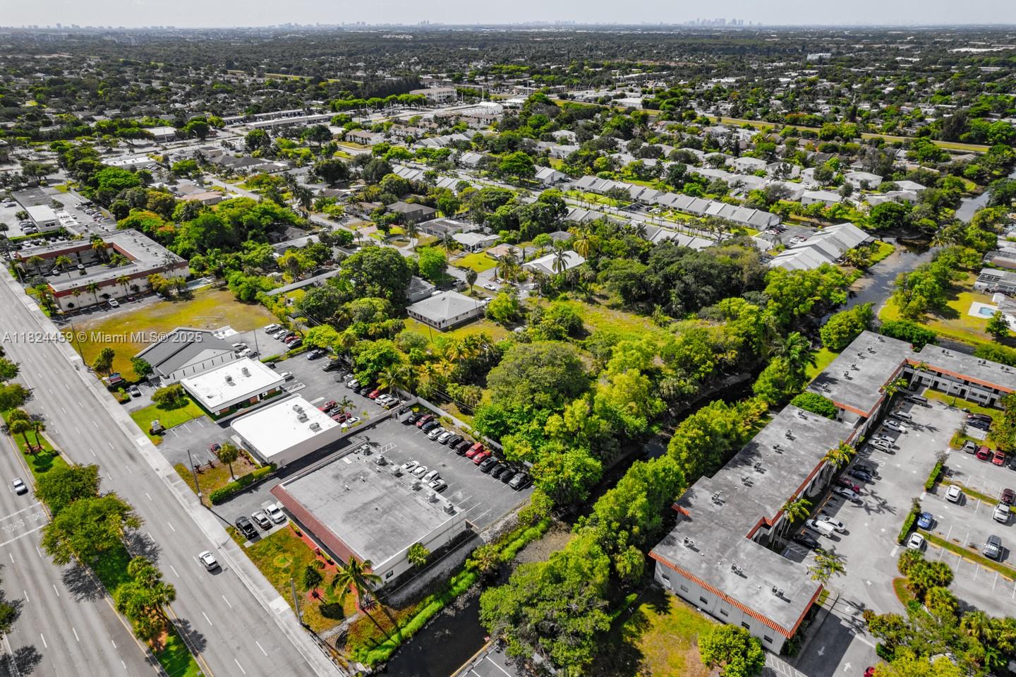 6214 Edwards Road Pompano Beach, FL 33063 - Photo 6 of 41 an aerial view of a city