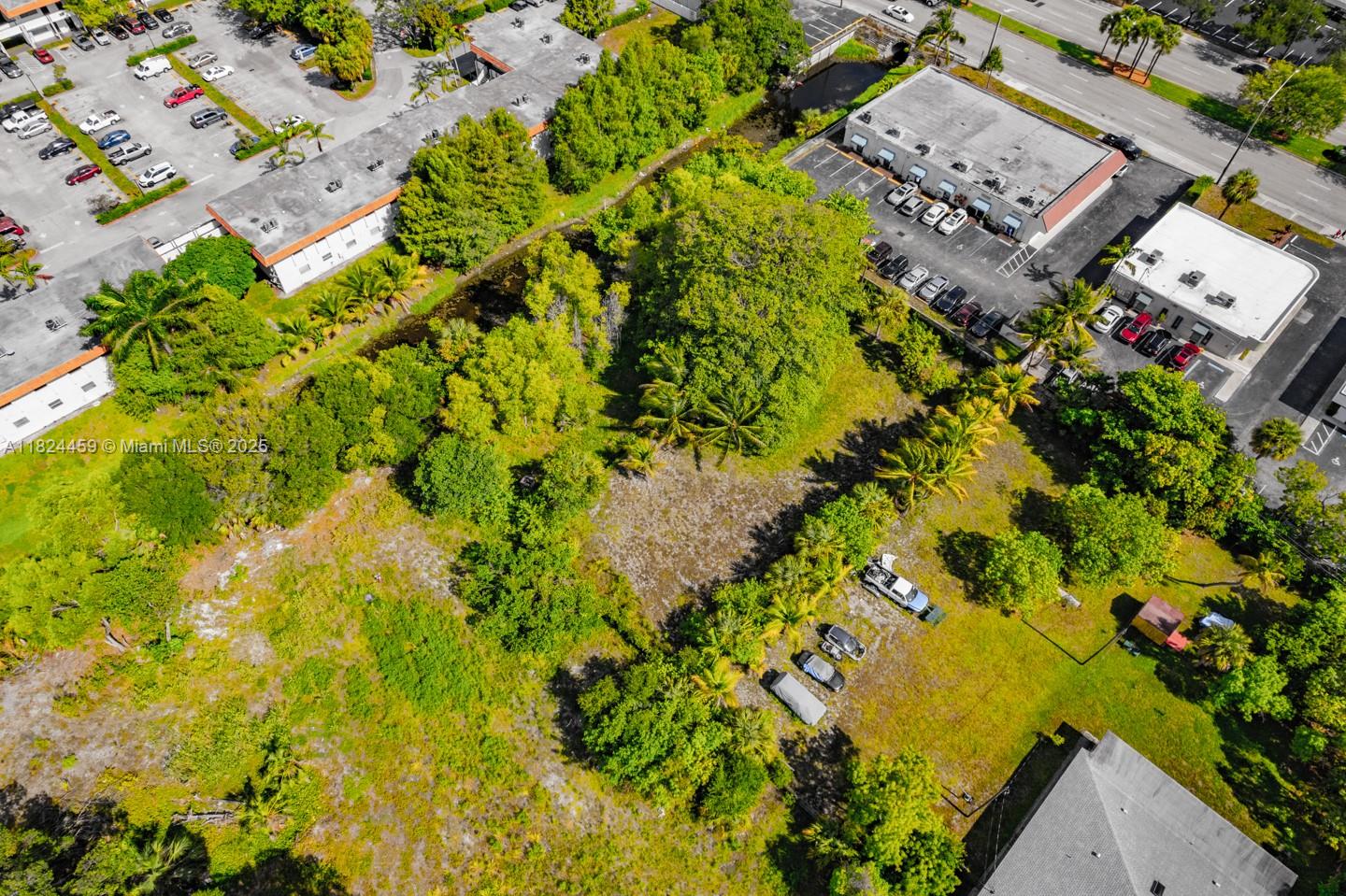 6214 Edwards Road Pompano Beach, FL 33063 - Photo 7 of 41 an aerial view of a residential houses with yard