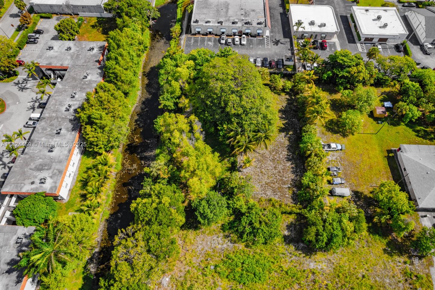 6214 Edwards Road Pompano Beach, FL 33063 - Photo 8 of 41 a aerial view of residential houses with outdoor space