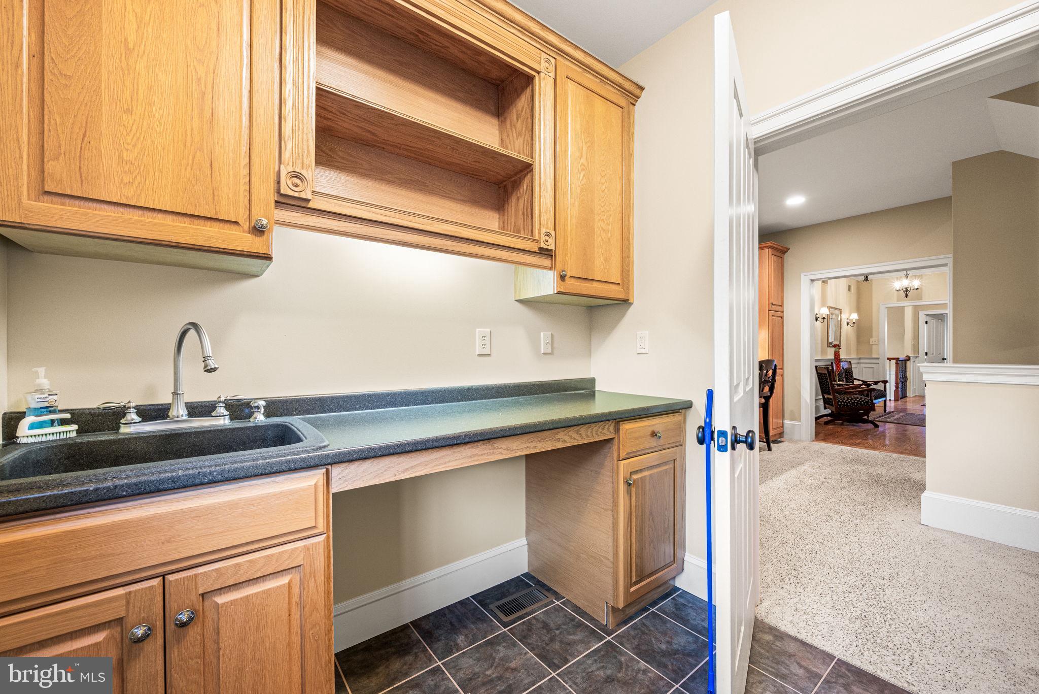 1548 Morstein Road Malvern, PA 19355 - Photo 54 of 80 a kitchen with a sink and cabinets