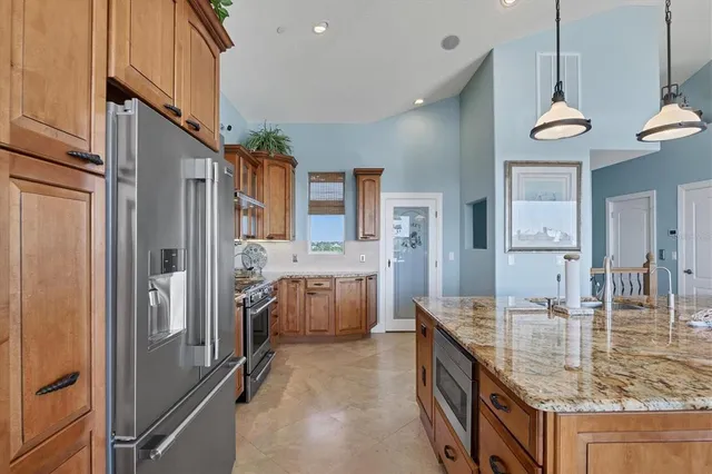 a view of a house with a flower garden