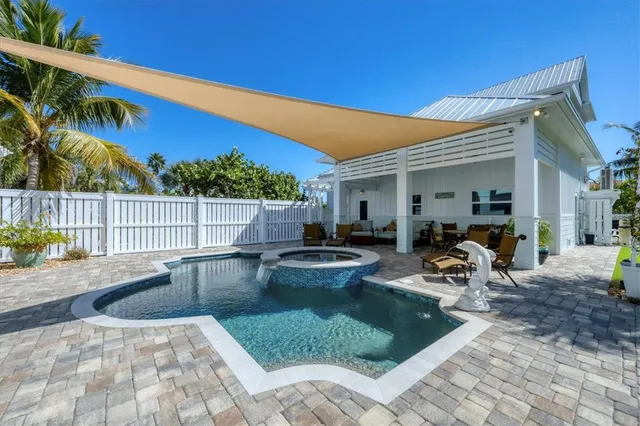 a view of a balcony with lake view and a floor to ceiling window