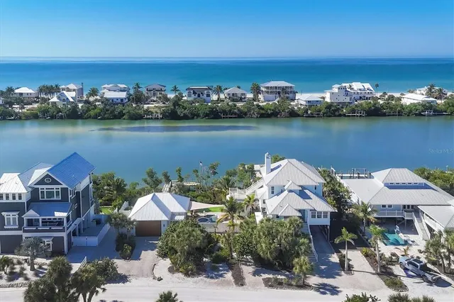 a bedroom with a bed and a mirror