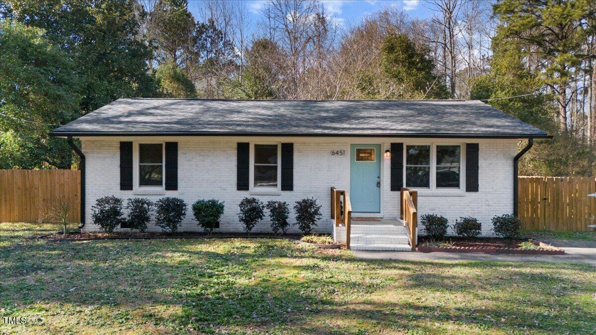 6451 Stewart Road Godwin, NC 28344 - Photo 1 of 37 a house view with a seating space