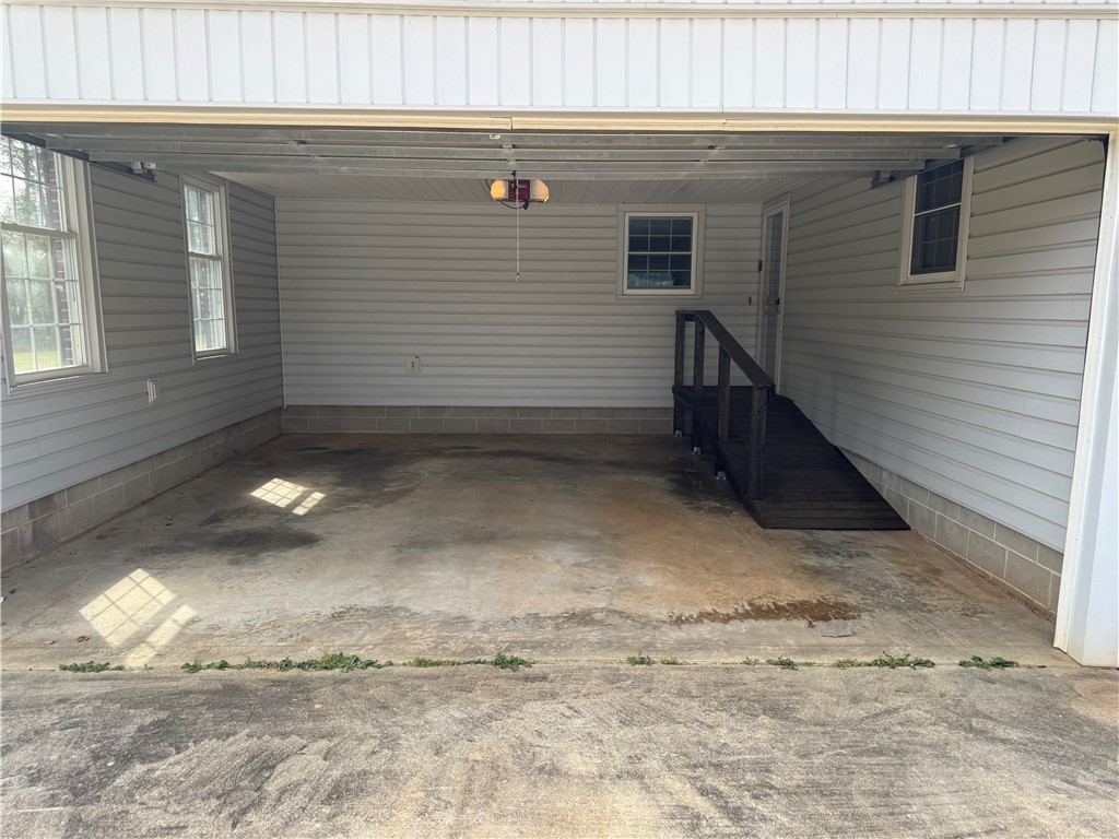 121 Nautical Way Anderson, SC 29625 - Photo 10 of 37 A spacious and practical garage features an accessible ramp, ideal for everyday convenience.