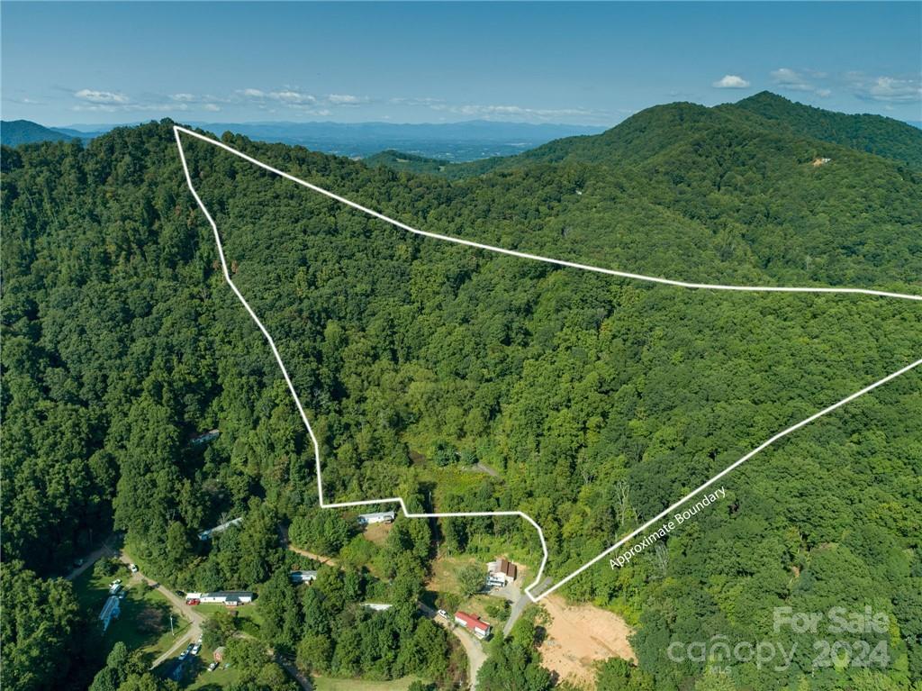 58 Grooms Road Candler, NC 28715 - Photo 12 of 12 a view of a tennis court