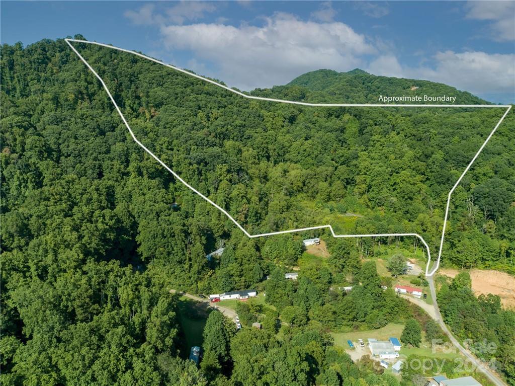 58 Grooms Road Candler, NC 28715 - Photo 9 of 12 a view of a tennis court