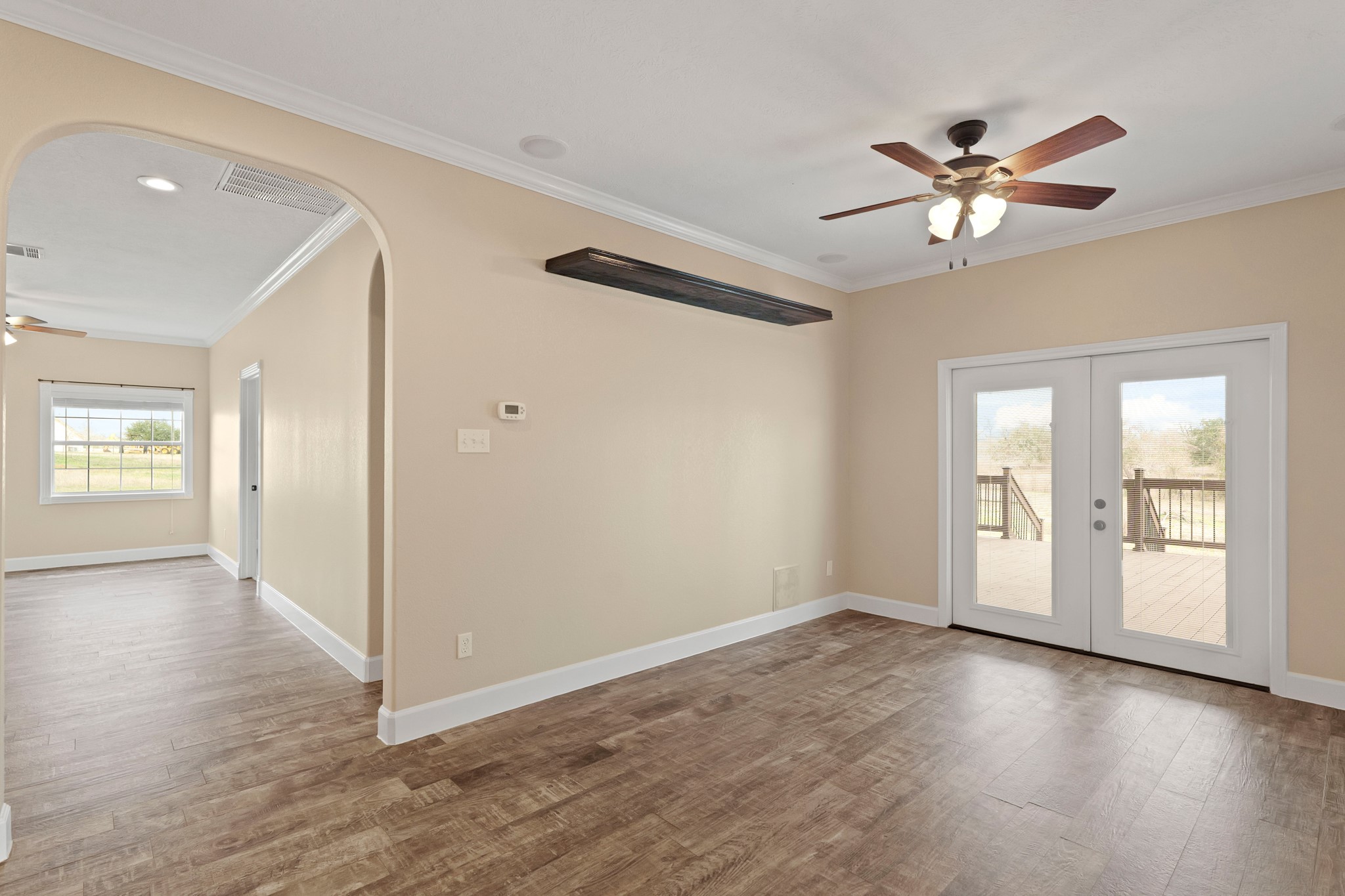 35408 Farm To Market Road 1488 Hempstead, TX 77445 - Photo 17 of 50 a view of an empty room with window and wooden floor