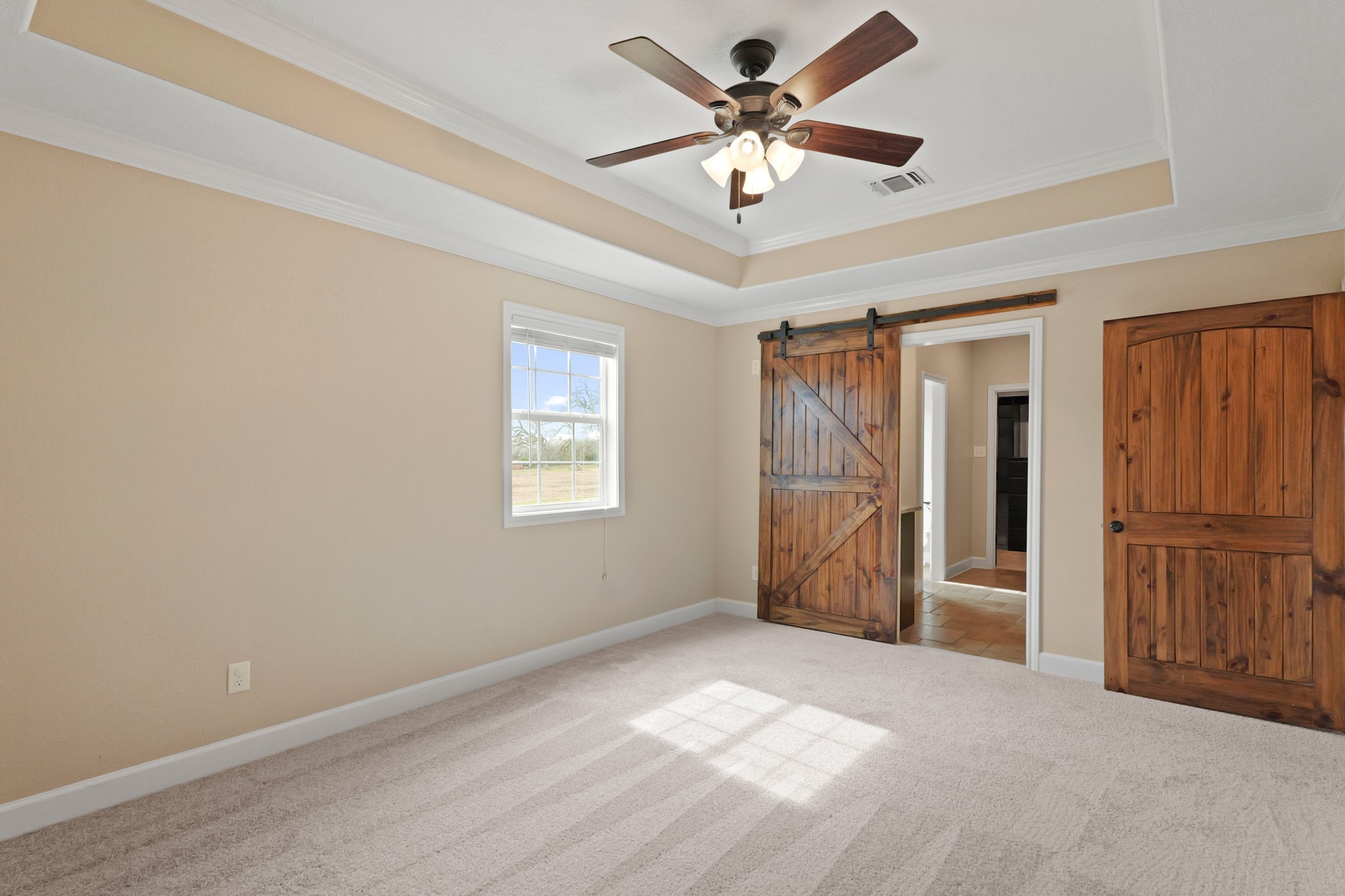 35408 Farm To Market Road 1488 Hempstead, TX 77445 - Photo 18 of 50 an empty room with closet and windows