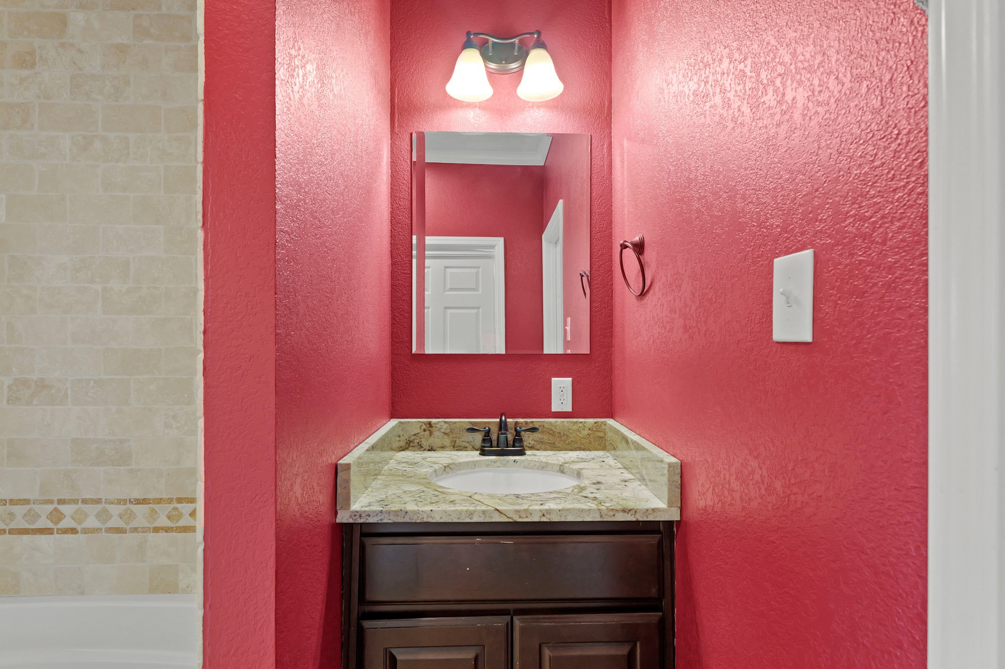 35408 Farm To Market Road 1488 Hempstead, TX 77445 - Photo 33 of 50 a bathroom with a granite countertop sink and a mirror
