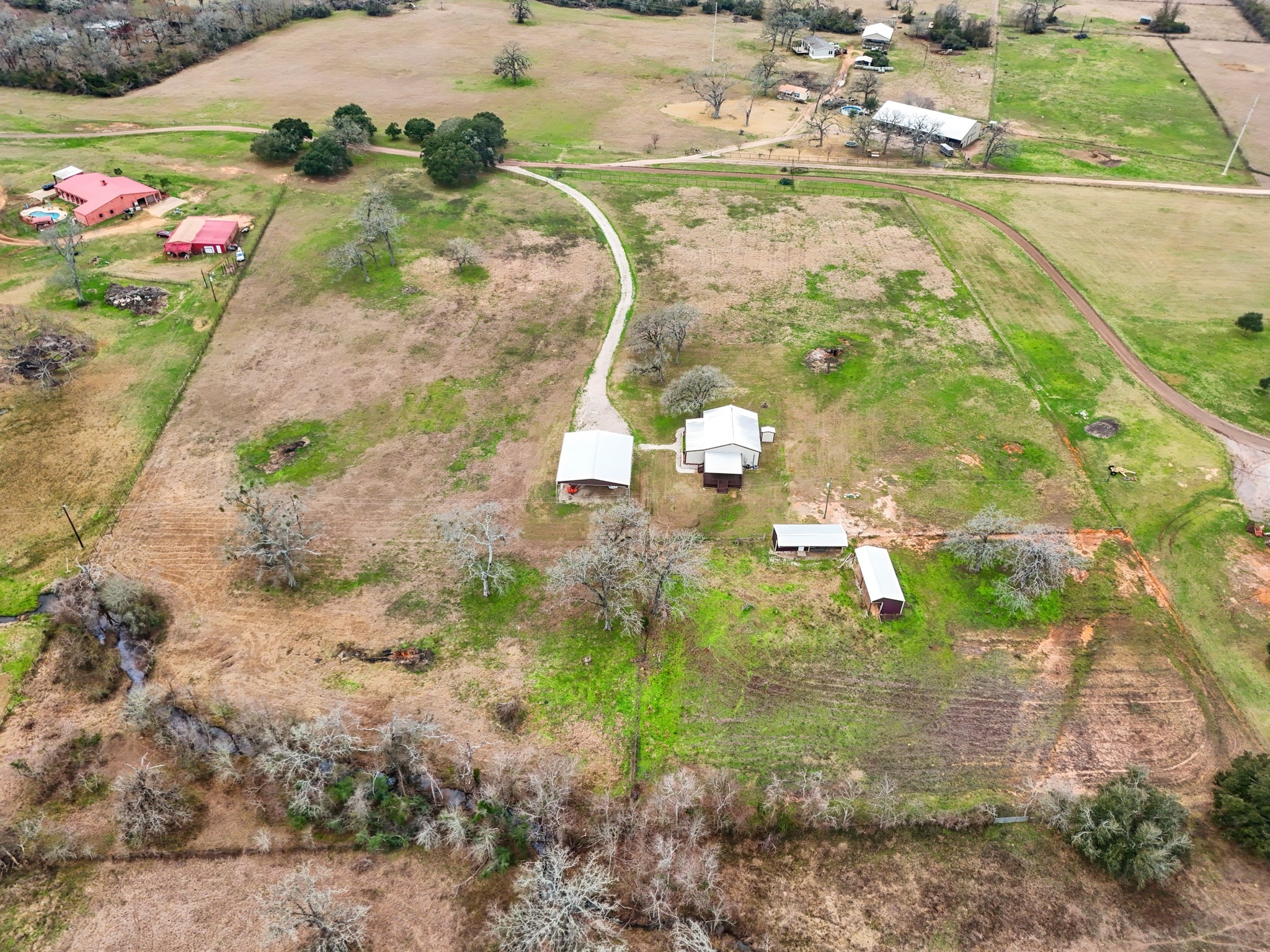 35408 Farm To Market Road 1488 Hempstead, TX 77445 - Photo 49 of 50 a view of a lake with a houses