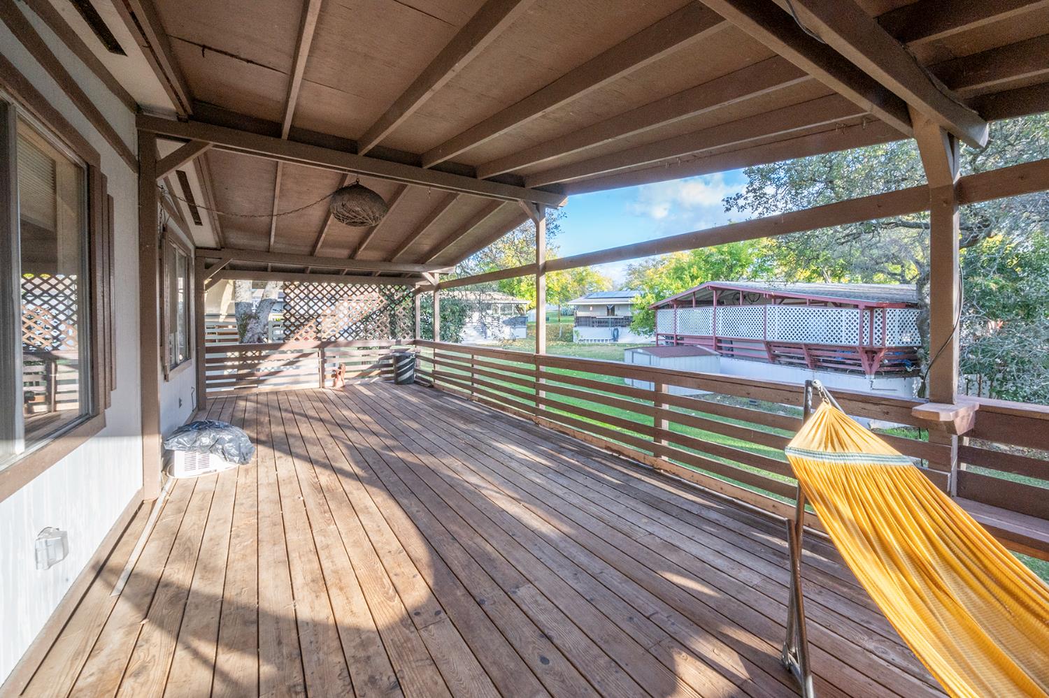 2000 Camanche Road, Unit 234 Ione, CA 95640 - Photo 11 of 41 a view of a balcony with wooden floor