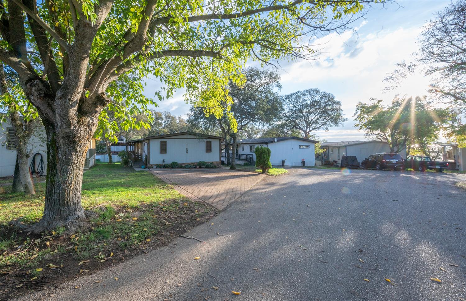 2000 Camanche Road, Unit 234 Ione, CA 95640 - Photo 14 of 41 a house with trees in front of it