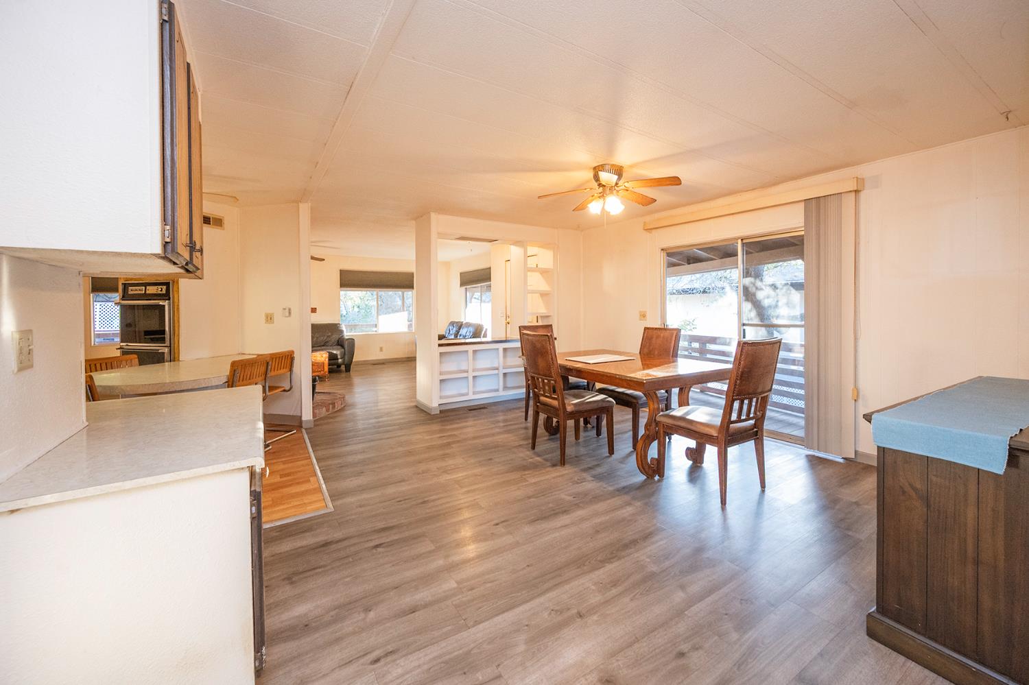 2000 Camanche Road, Unit 234 Ione, CA 95640 - Photo 28 of 41 a view of a a dining room with furniture window and wooden floor