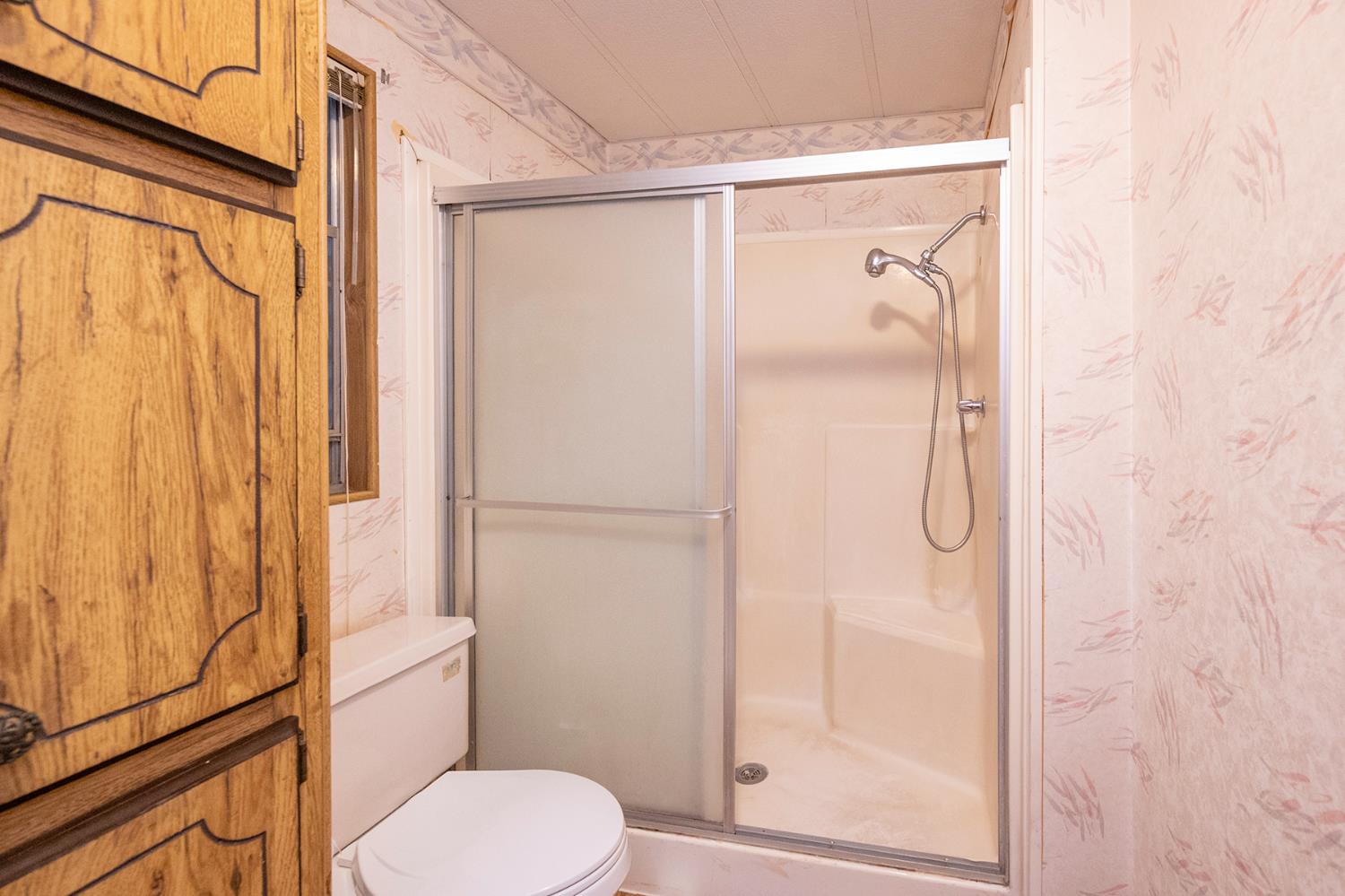 2000 Camanche Road, Unit 234 Ione, CA 95640 - Photo 34 of 41 a bathroom with a shower toilet and sink