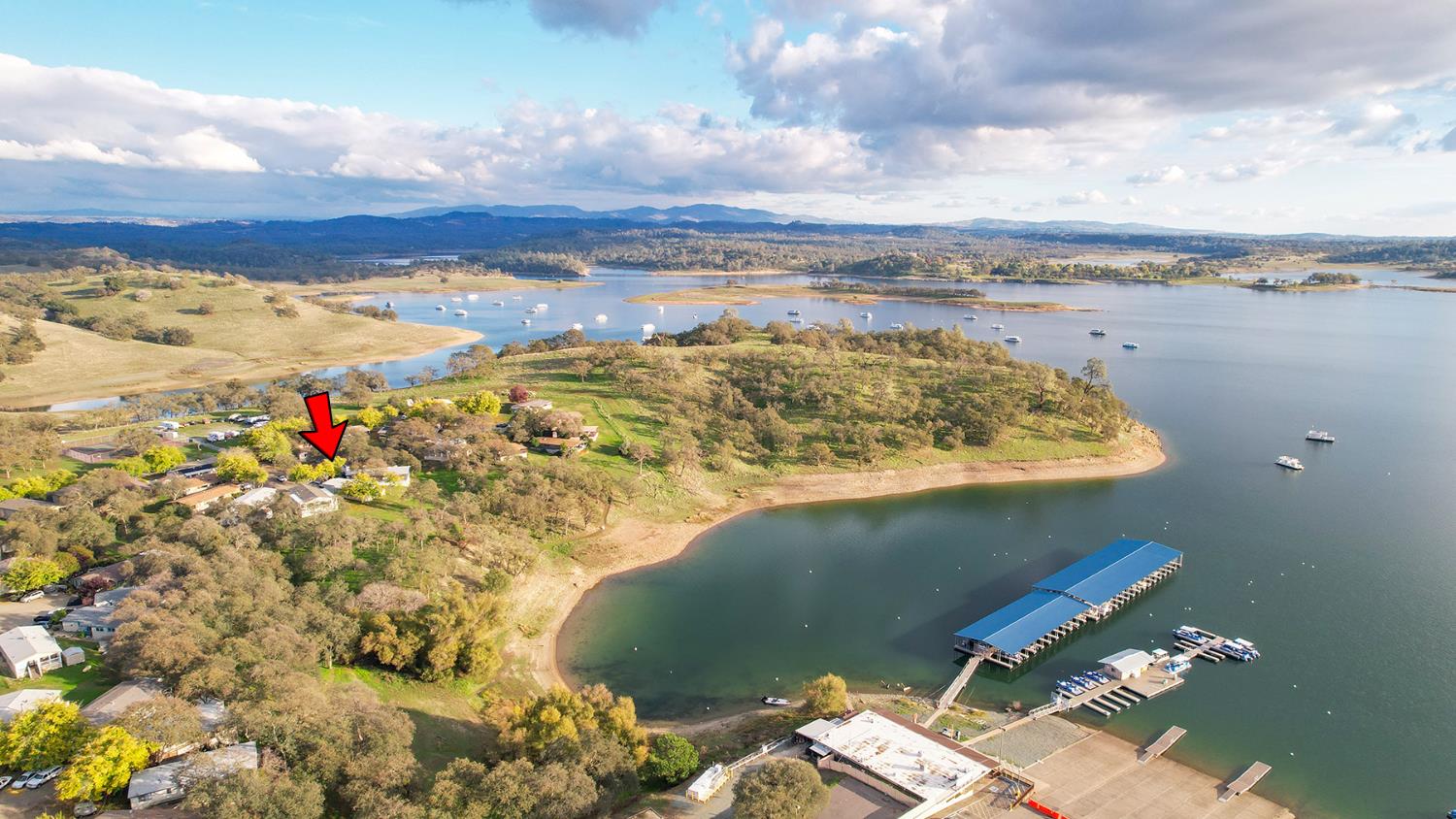 2000 Camanche Road, Unit 234 Ione, CA 95640 - Photo 6 of 41 a view of a lake and mountain