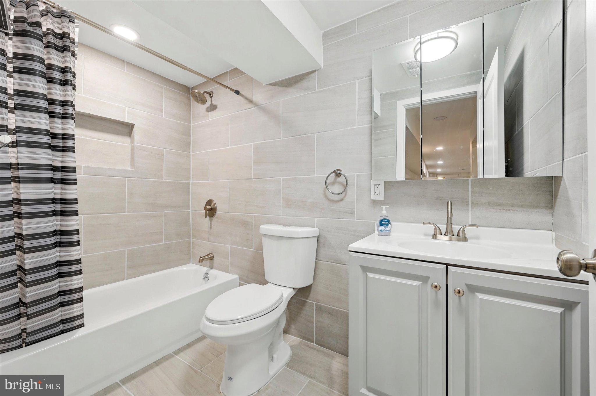 514 Ryers Avenue, Unit A Cheltenham, PA 19012 - Photo 12 of 18 Modern bathroom with sleek finishes.