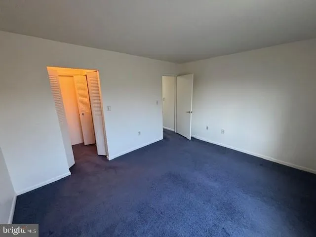 an empty room with closet