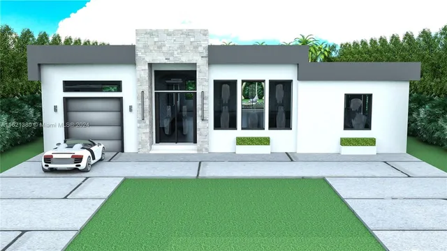 a front view of a house with a garden and yard