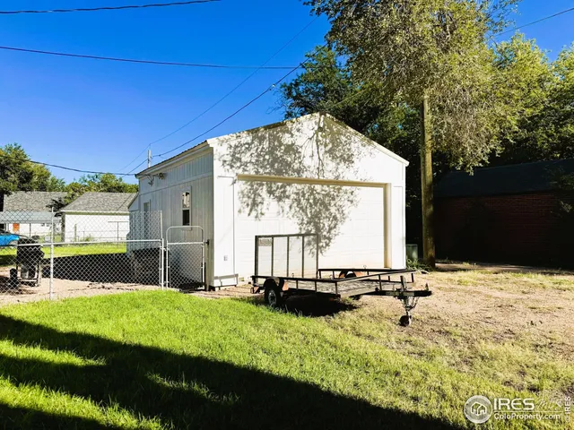 a view of swimming pool with a yard