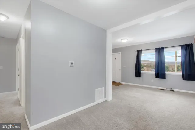 an empty room with window