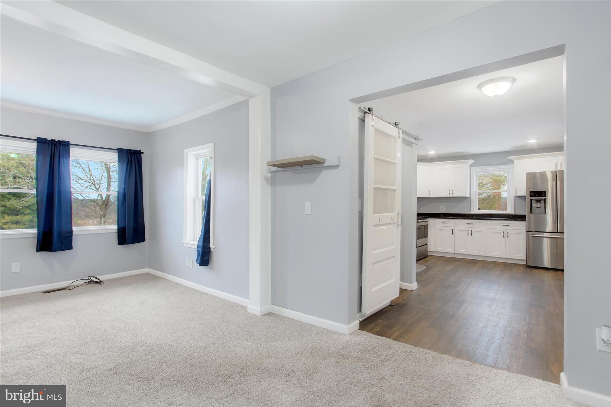 3700 Baltimore Pike Hanover, PA 17331 - Photo 5 of 21 a view of a kitchen with refrigerator and windows