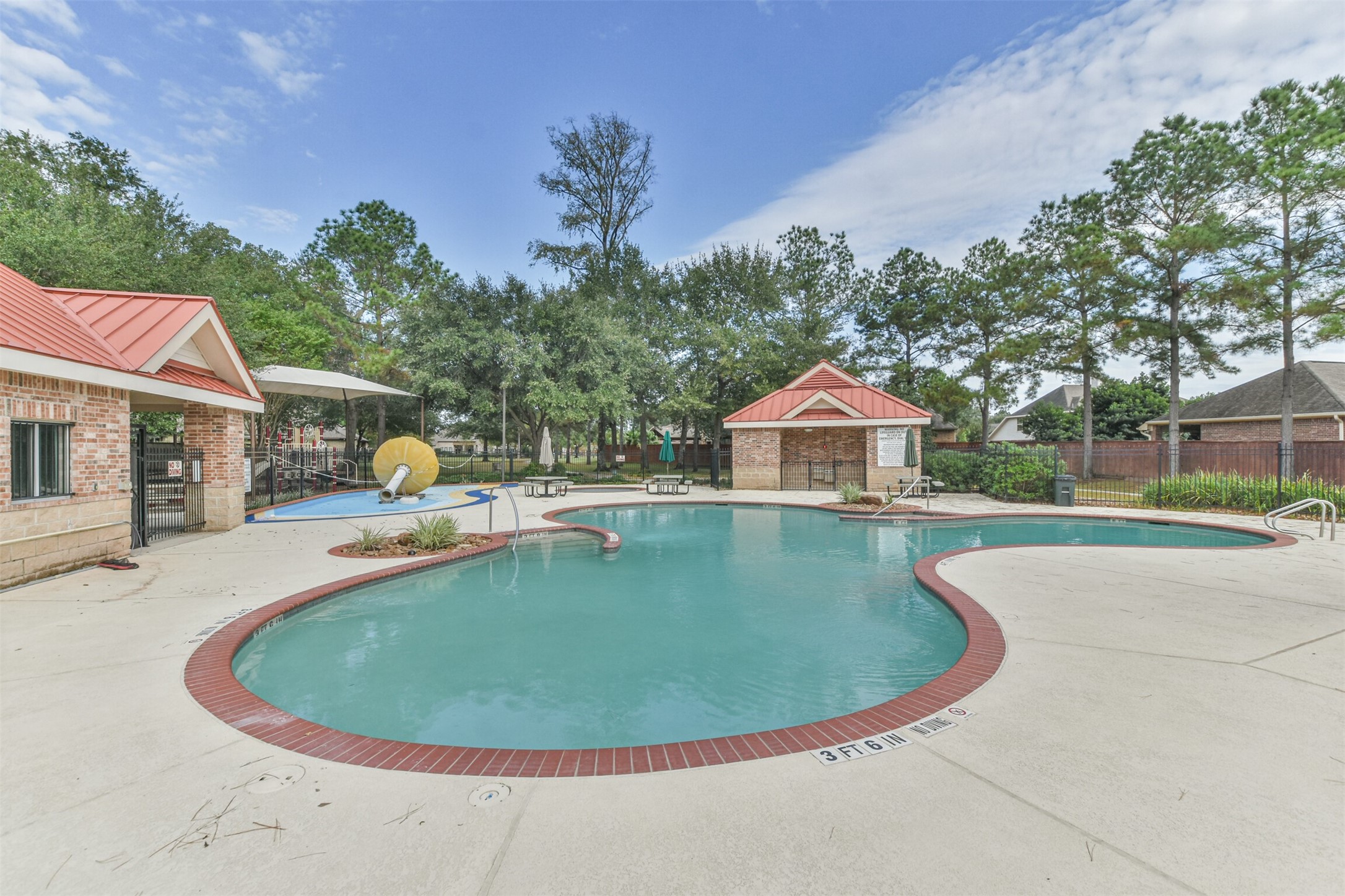 18743 Duke Lake Drive Spring, TX 77388 - Photo 2 of 42 a view of a swimming pool with a patio
