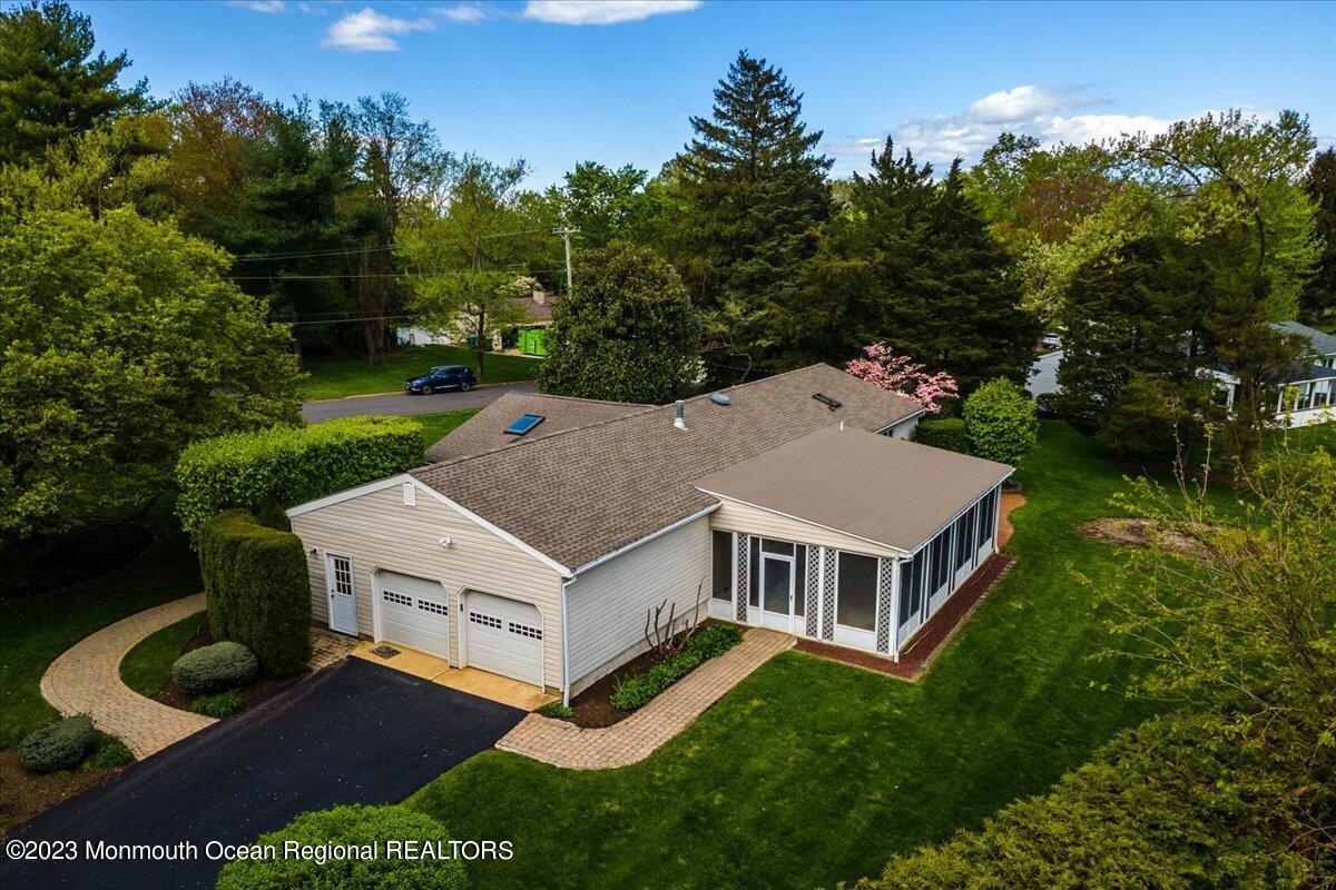56 Wyckham Road Tinton Falls, NJ 07724 - Photo 5 of 40 an aerial view of a house with yard and green space