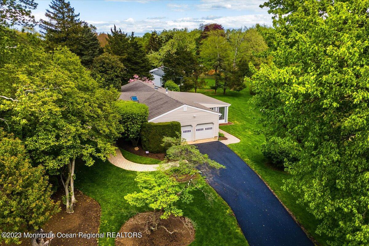 56 Wyckham Road Tinton Falls, NJ 07724 - Photo 6 of 40 an aerial view of a house with a yard