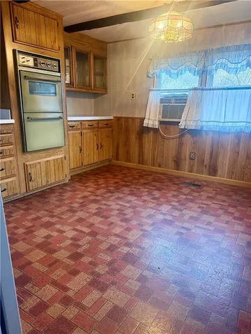 a view of a kitchen with a sink