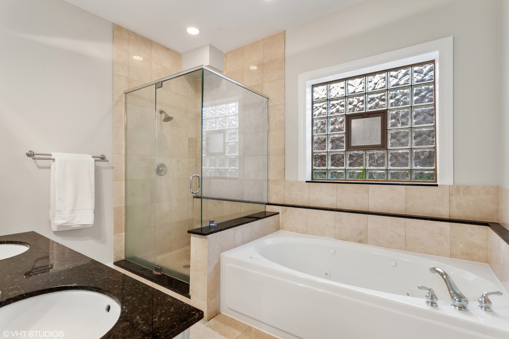 1363 North Mohawk Street, Unit 1 Chicago, IL 60610 - Photo 12 of 14 a bathroom with a granite countertop sink mirror bathtub and toilet