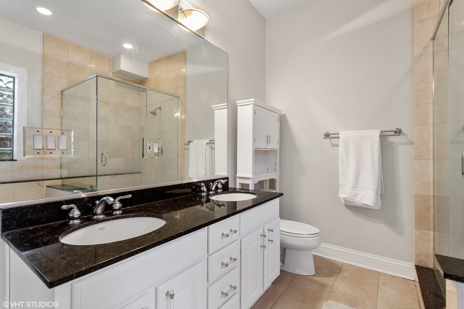 1363 North Mohawk Street, Unit 1 Chicago, IL 60610 - Photo 13 of 14 a bathroom with a granite countertop double vanity sink and a mirror