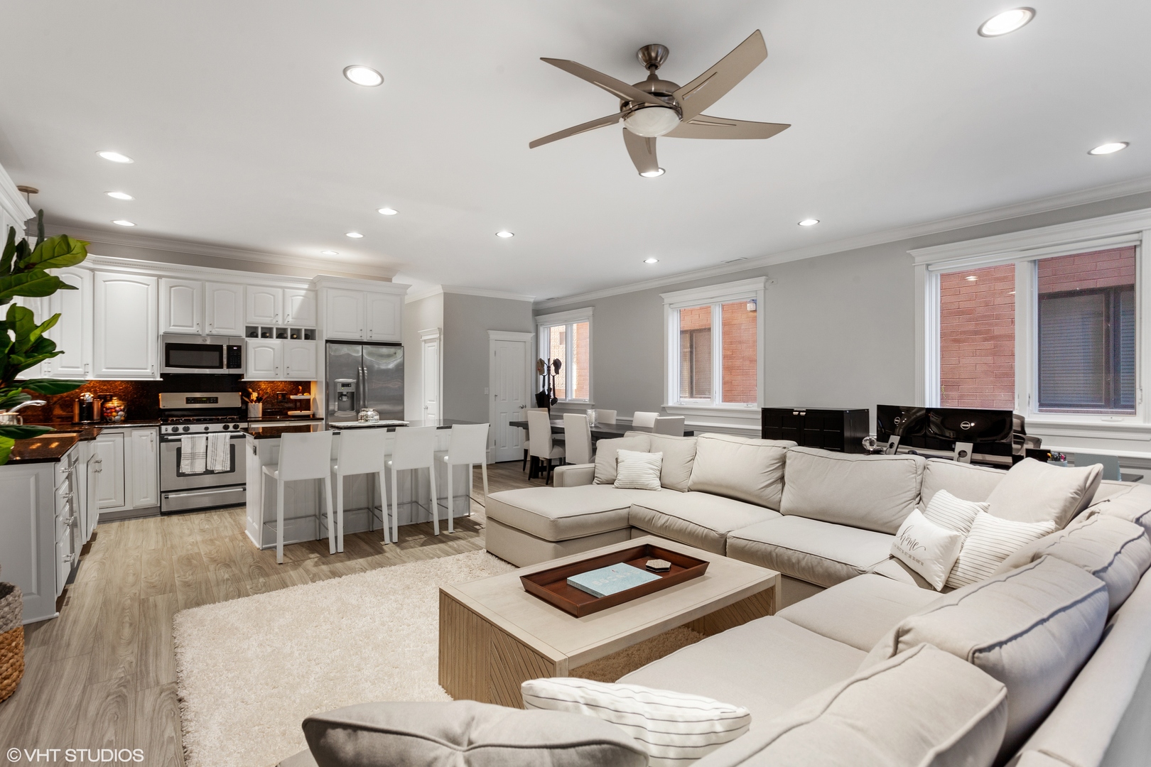 1363 North Mohawk Street, Unit 1 Chicago, IL 60610 - Photo 5 of 14 a living room kitchen with furniture and kitchen view