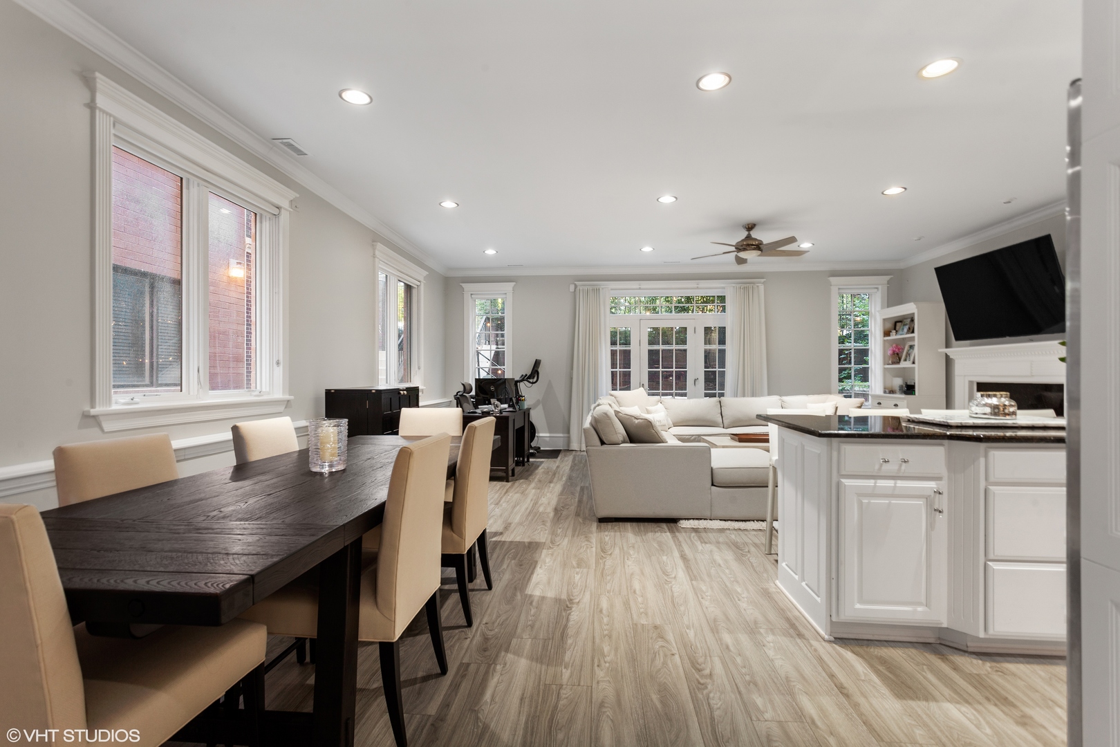 1363 North Mohawk Street, Unit 1 Chicago, IL 60610 - Photo 8 of 14 a large kitchen with a table and chairs in it