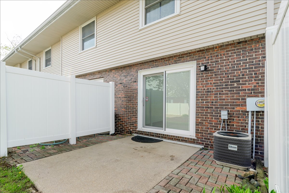 103 South Towanda Avenue, Unit 3 Normal, IL 61761 - Photo 15 of 17 a view of a house with a door and wooden floor