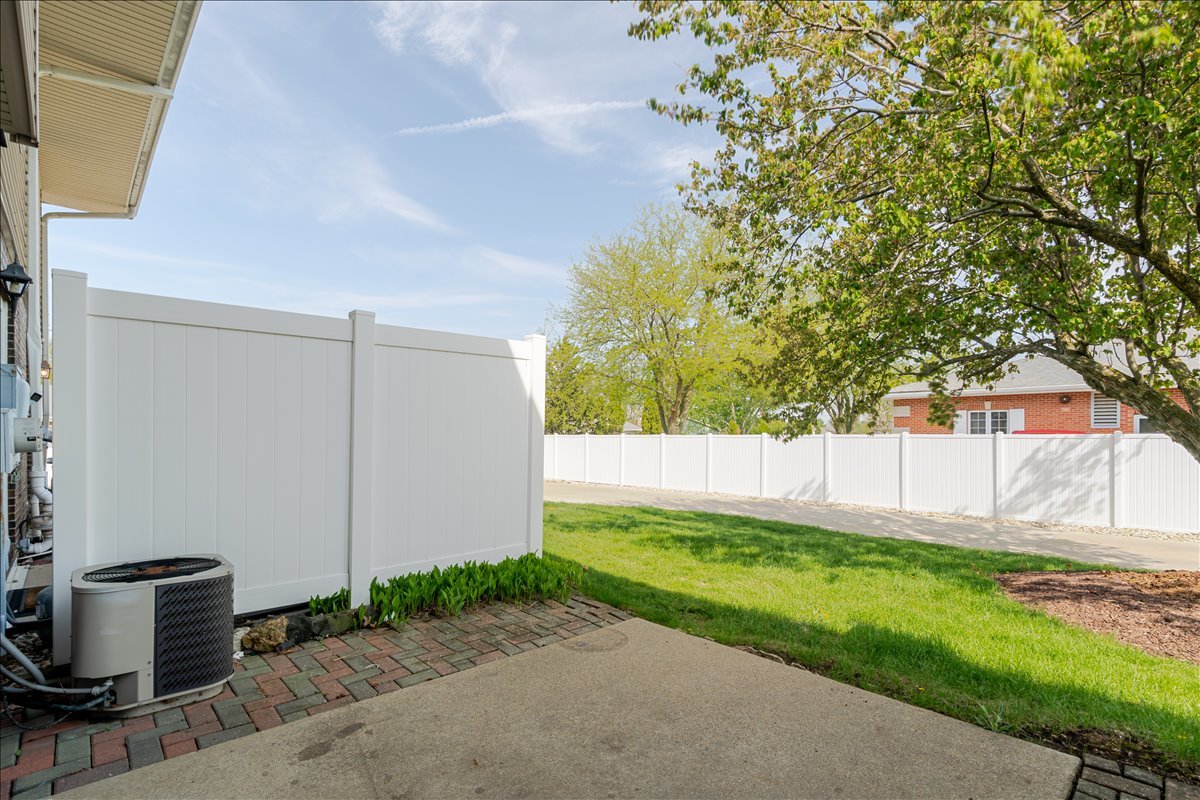 103 South Towanda Avenue, Unit 3 Normal, IL 61761 - Photo 16 of 17 a view of backyard with swimming pool and green space