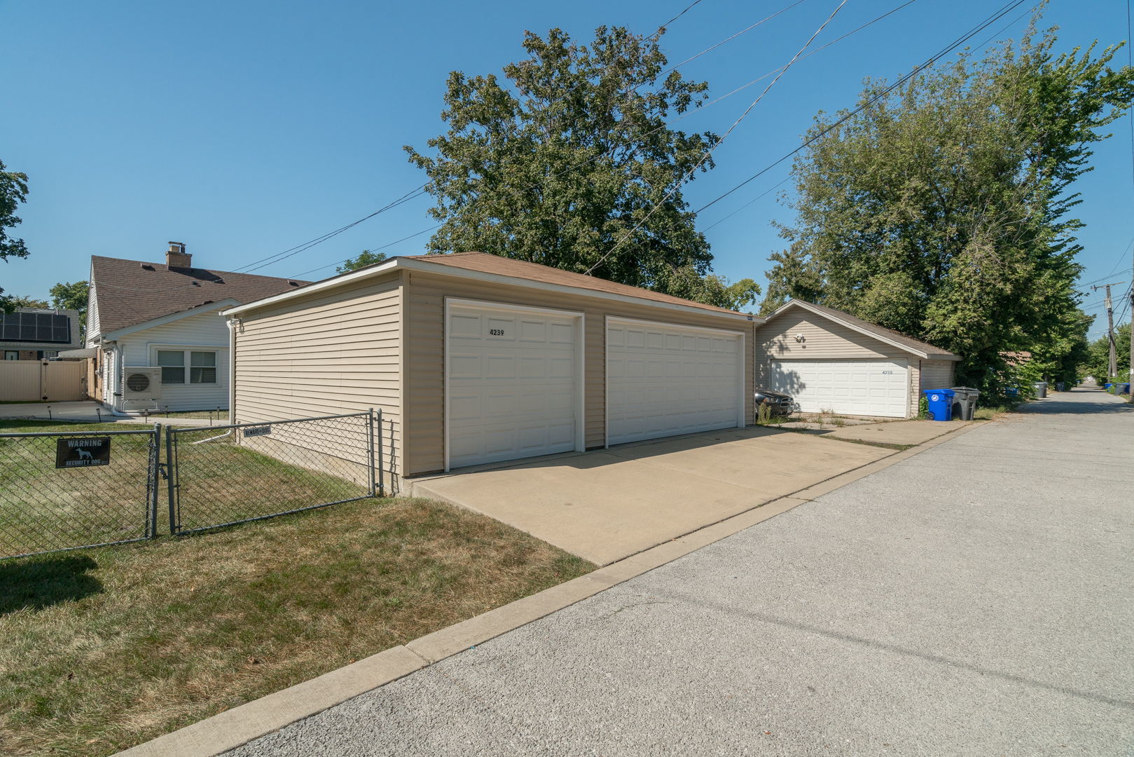 4239 Custer Avenue Lyons, IL 60534 - Photo 2 of 27 a view of garage and tree