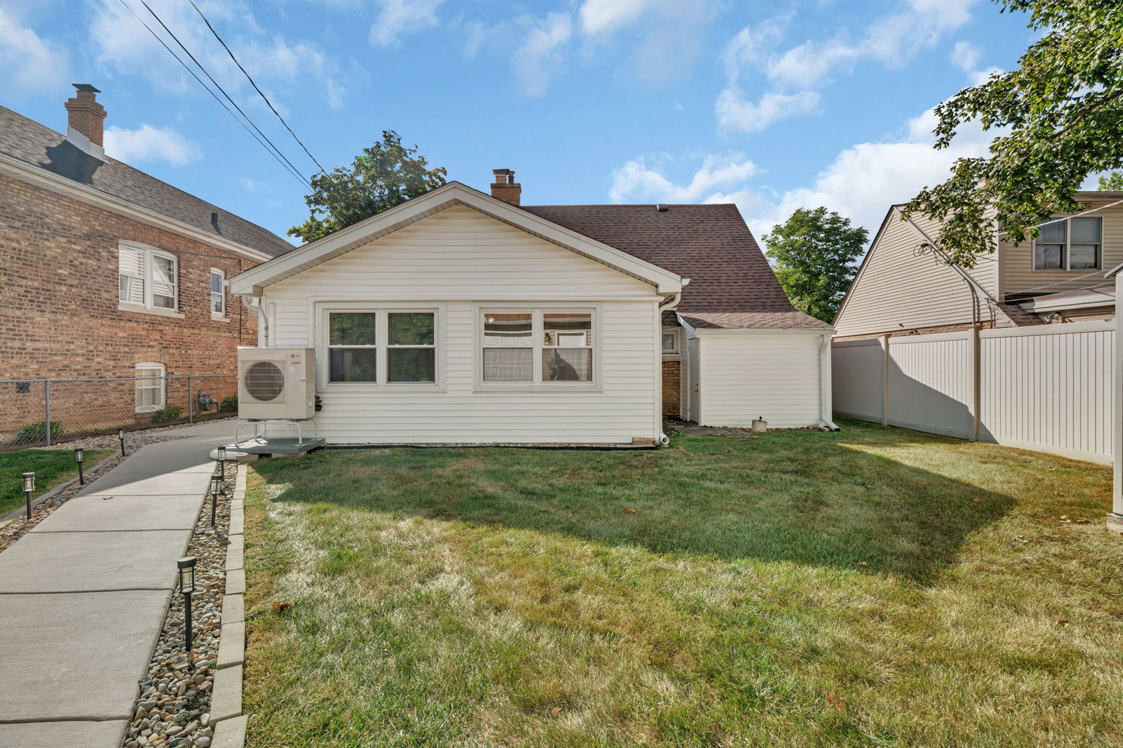 4239 Custer Avenue Lyons, IL 60534 - Photo 27 of 27 a view of a yard in front of a house with plants