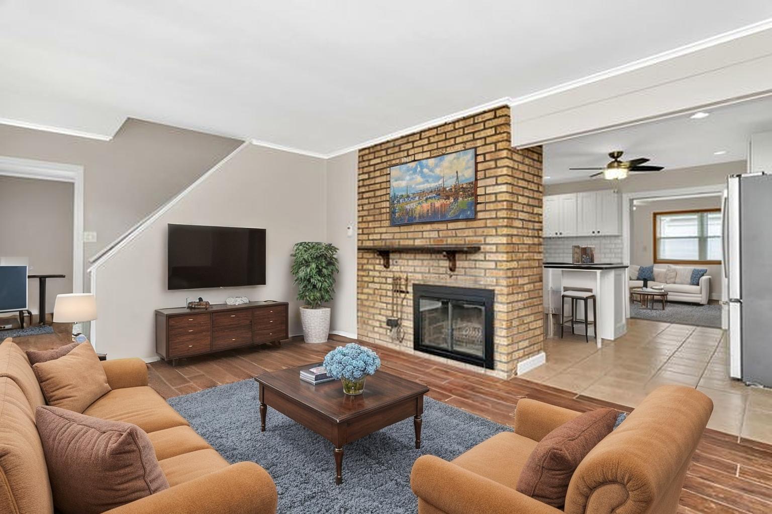 4239 Custer Avenue Lyons, IL 60534 - Photo 5 of 27 a living room with furniture or fireplace and a flat screen tv