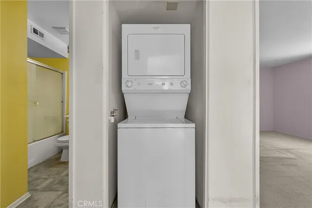 a view of bathroom with a toilet and a sink