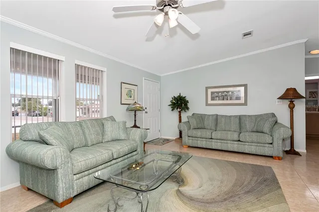 a living room with furniture and a couch