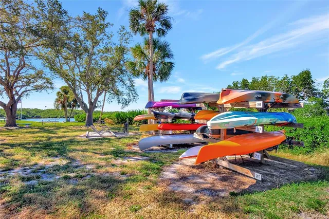 a childrens park with lots of swings and slides