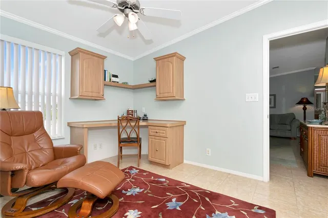 a workspace with furniture and window