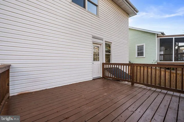 a view of a house with wooden stairs