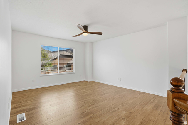 2007 Fielding Hill Lane Draper, UT 84020 - Photo 26 of 83 Spacious room with wood-finish flooring and a contemporary ceiling fan